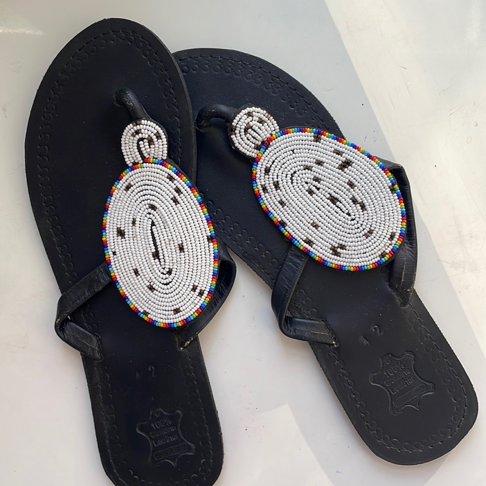 Never worn hand made, beaded African sandals.